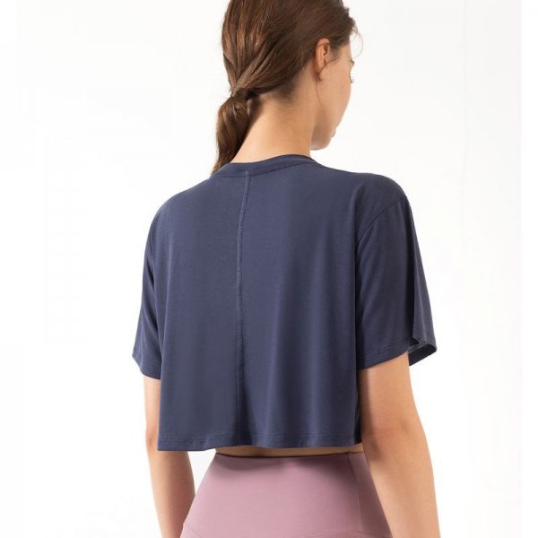 The back yoga stretch tight carry buttock suits female with short sleeves