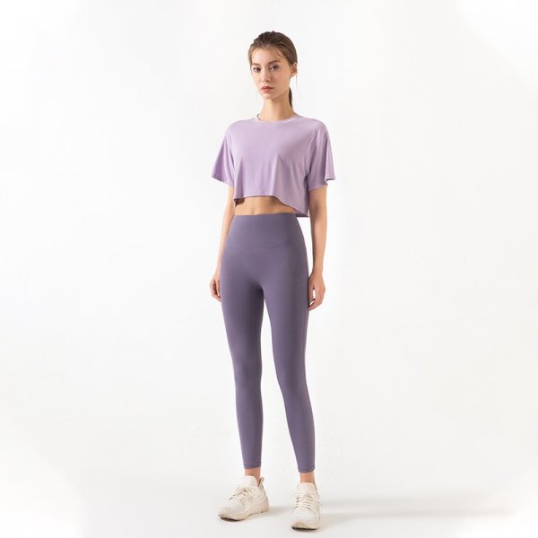 The back yoga stretch tight carry buttock suits female with short sleeves